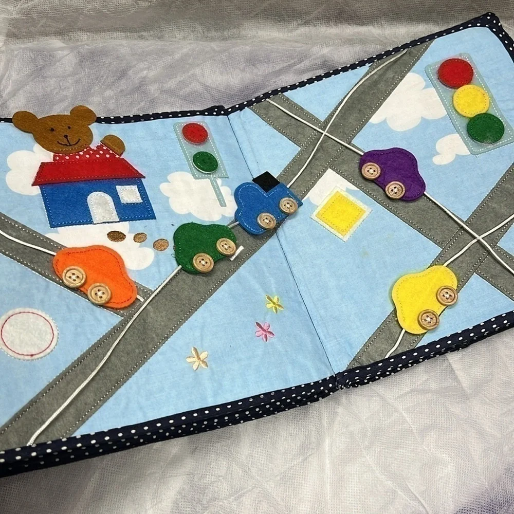 Free Large Diaper Travel Baby bag & the fabric book w. Purchase of $25+